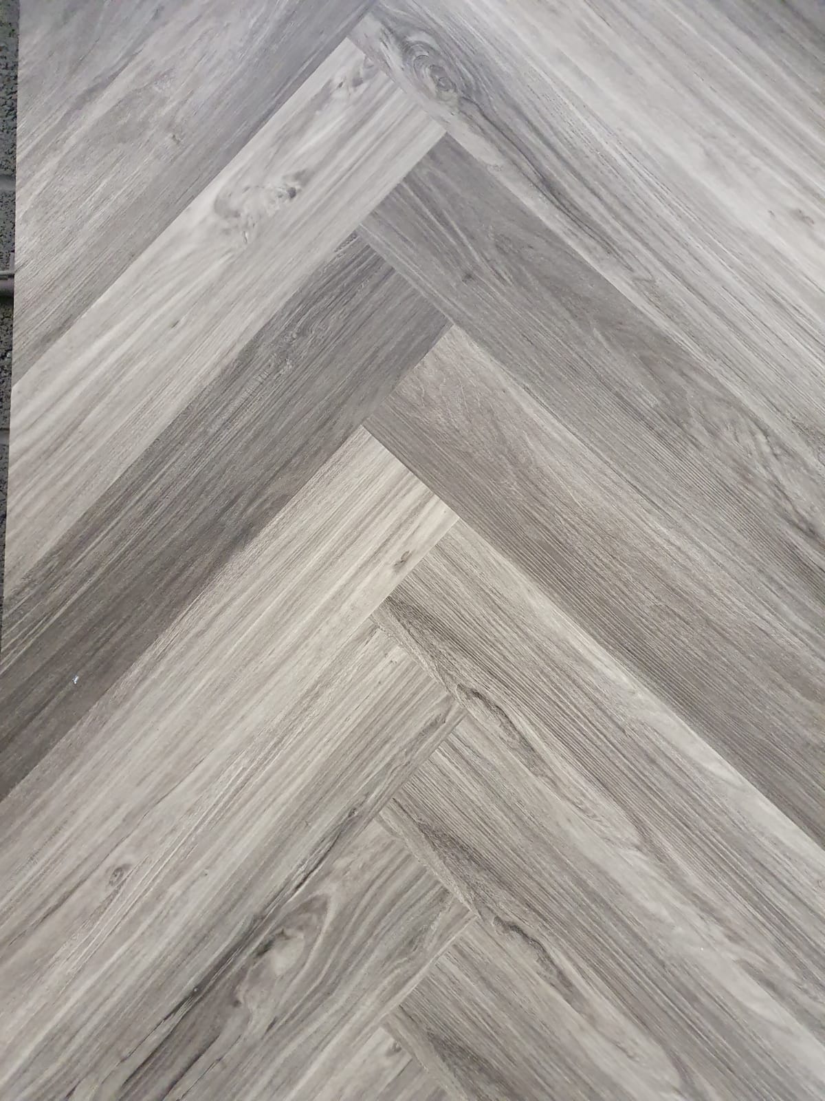Fumed Oak Grey LVT Herringbone Flooring - Floor Depot