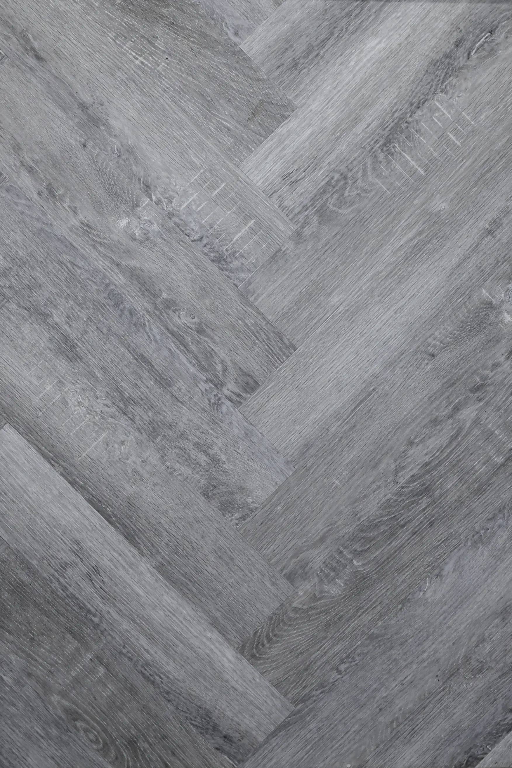 Dark Distressed PREMIUM Herringbone 6.0 SPC Vinyl Click