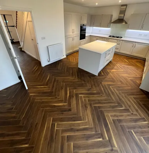 Java Scraped Oak Baseboard Java Oak 12mm Herringbone | Floor Depot